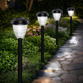 URAGO Super Bright Solar Lights Outdoor Waterproof-4 Pack, Dusk to Dawn Up to 12 Hrs Solar Garden Lights Outdoor Pathway Auto On/Off, LED Landscape Decorative Lighting for Walkway Patio Yard Outside