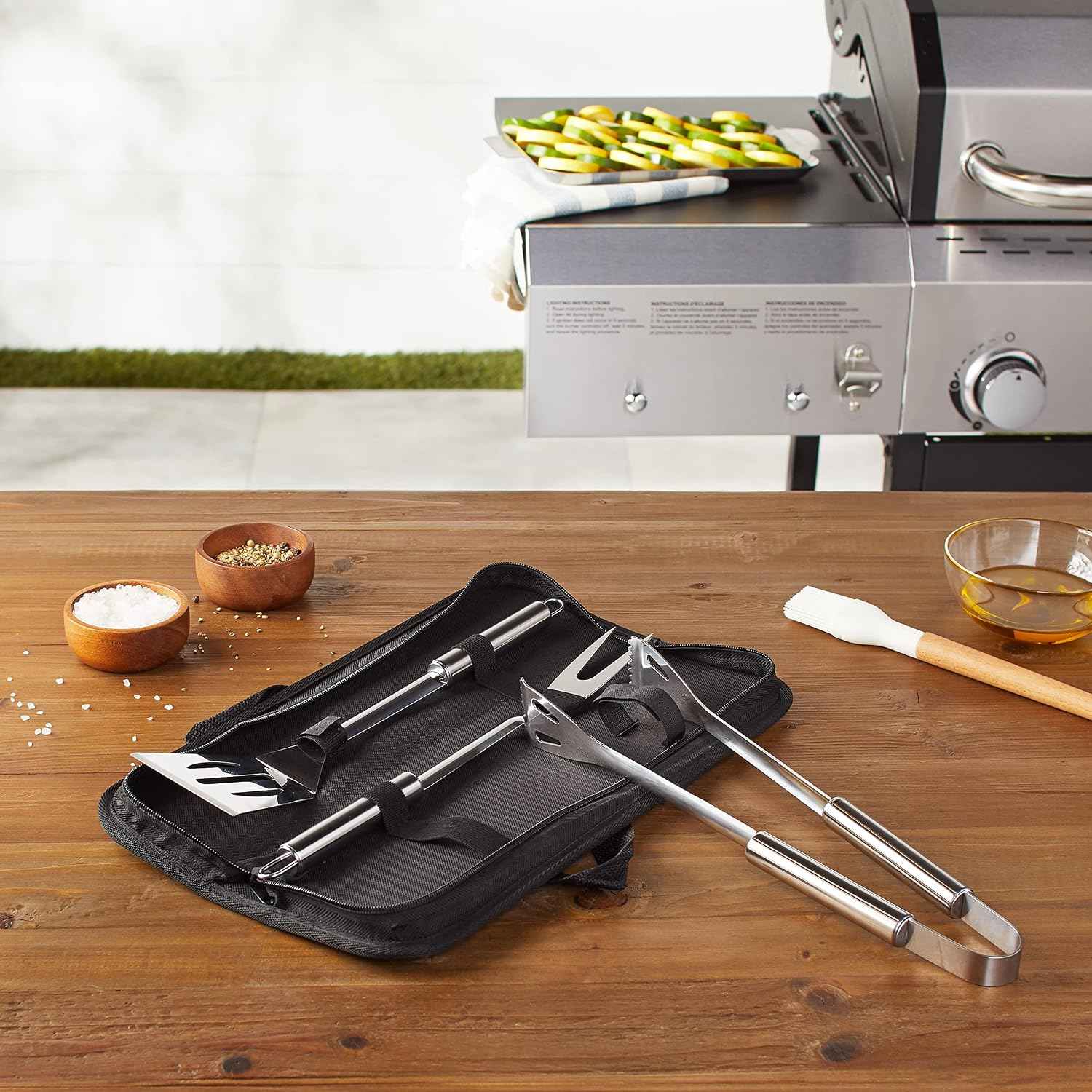 Amazon Basics 4-Piece Stainless Steel BBQ Grilling Tool Set with Carry Bag, Rust-Resistant, Dishwasher Safe